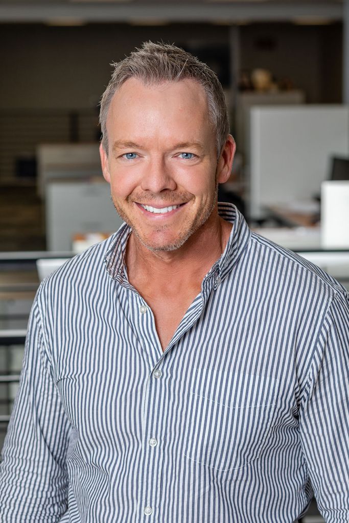 Matt Boelman headshot in the perficut office