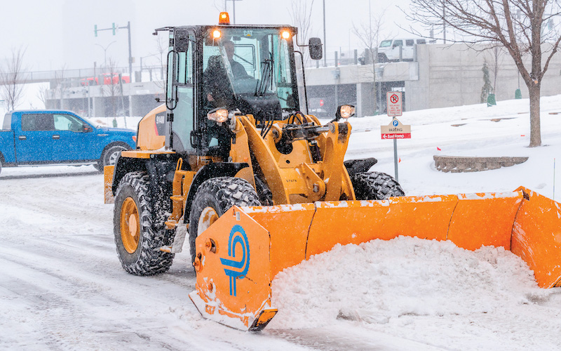 Perficut tractor removing snow