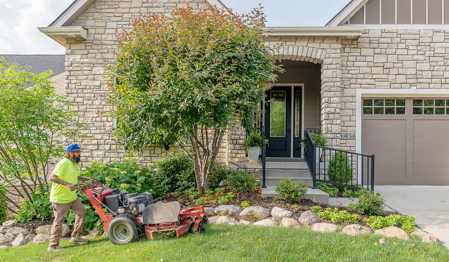 Perficut team member mowing