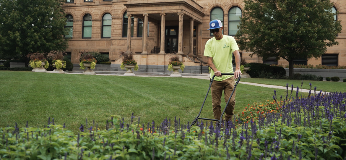 Perficut mowing with manual mower at World Food Prize in Des Moines