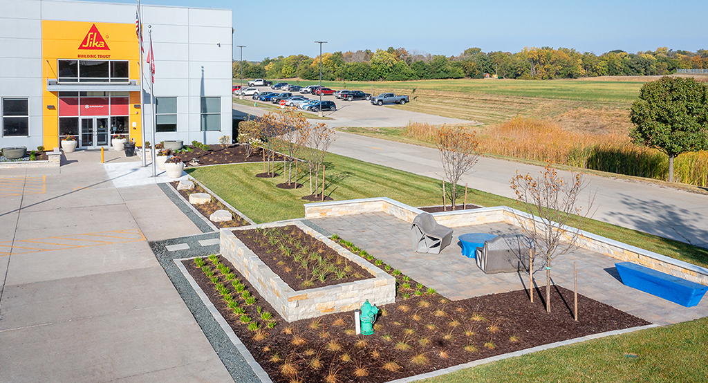 Colorbiotics exterior patio with perennial plantings in straight-line design landscape concept